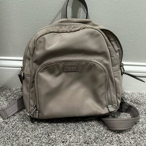 Kate Spade Gray Backpack with Adjustable Straps and Compact Design